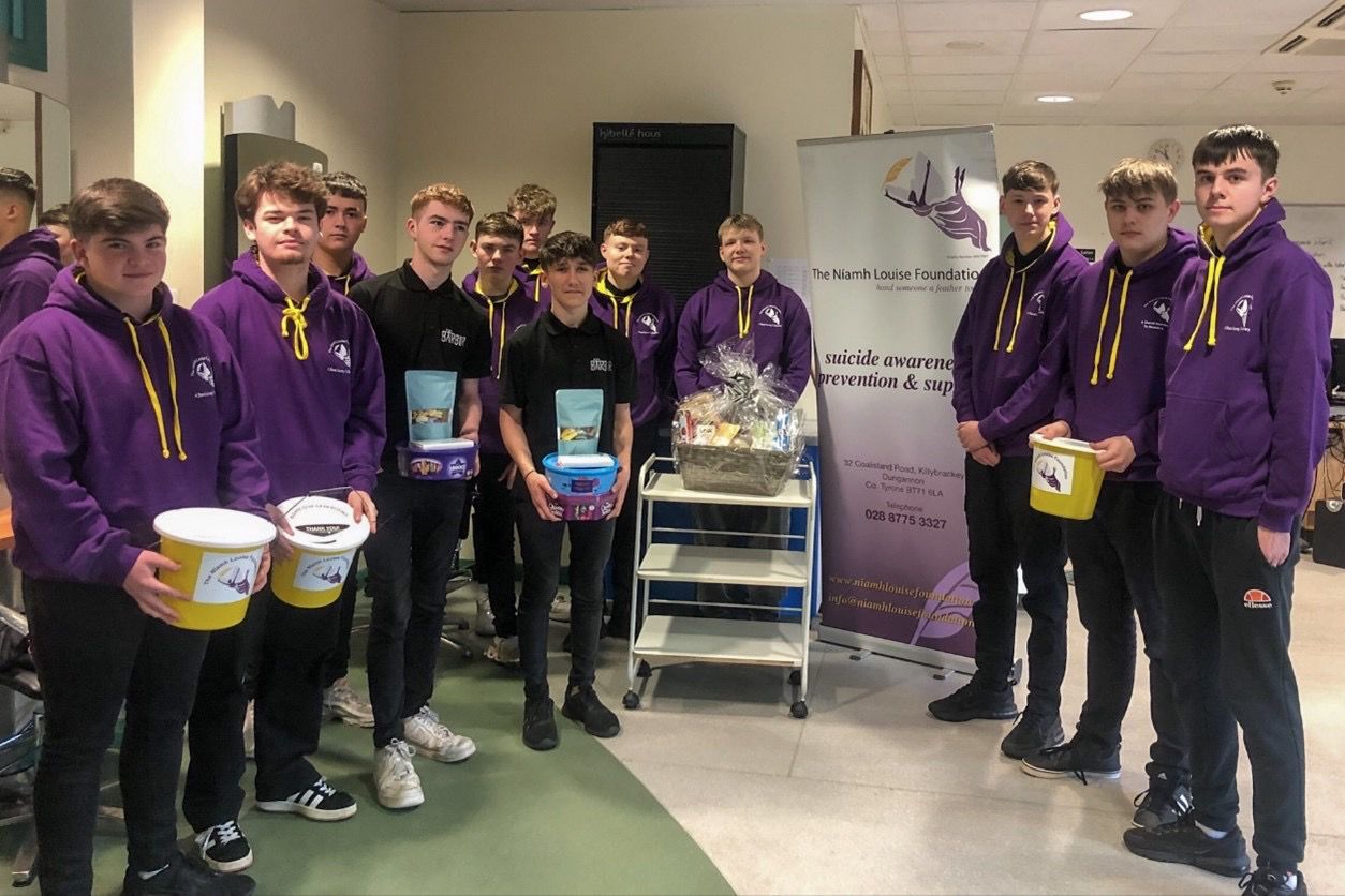 Young people fundraising for the Niamh Louise Foundation with collection buckets